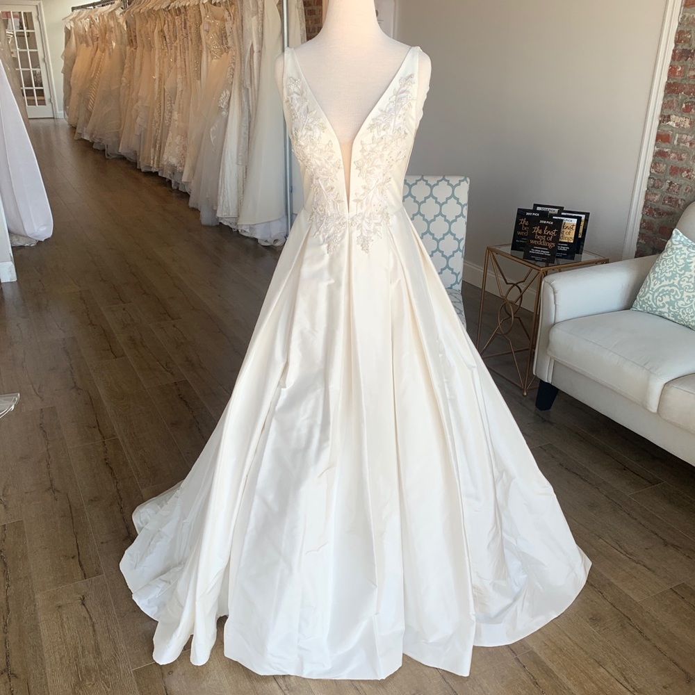 Never worn before. Never tailored. Brand new. Veil also unworn can be included.